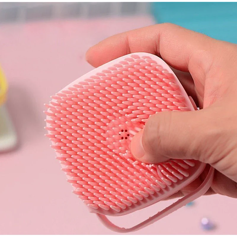 Burete din silicon cu rezervor pentru sampon si gel de dus, 80 ml roz